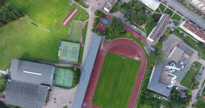 4k Drone top view shot of the Ventspils Olympic center