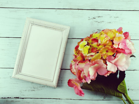 photo frame mock up with space background and flower bouquet