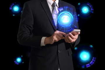 Double exposure of businessman hand hold and touch screen smartphone, mobile and digital cyber circular future as business, technology, communication and innovation concept.