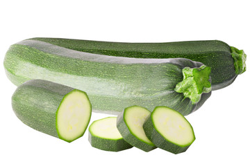 Two courgettes and slices isolated on white