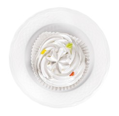 Cupcake on a plate - isolated image