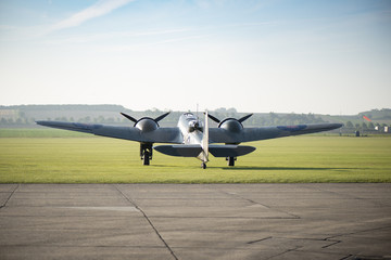 Vintage British World War II Bomber Parked by a Runway