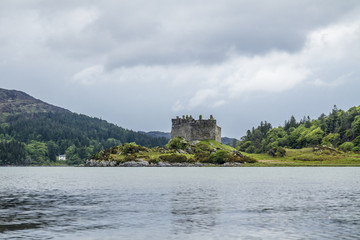Fototapeta na wymiar Castle Tioram - a ruined castle on a tidal island in Loch Moidart, Lochaber, Highland, Scotland