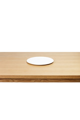 wood table with empty dish isolated on the white background