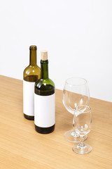 wine bottle and glasses on the wood table isolated on the white background