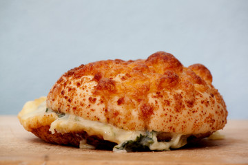 Burger mix cheese on wood floor background.
