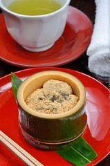 Warabi mochi with green tea on thetable