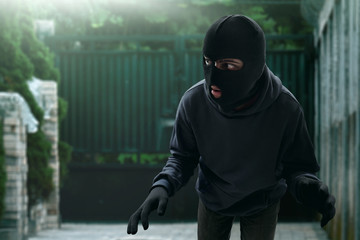 Masked thief sneak