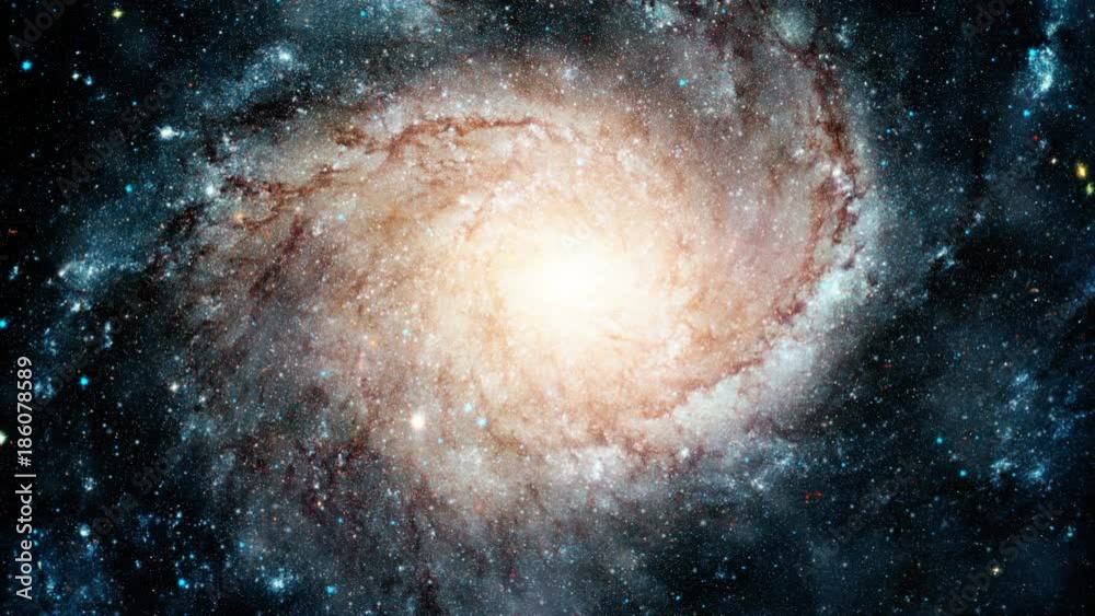 Wall mural flight near a rotating spiral galaxy. abstract loopable background.