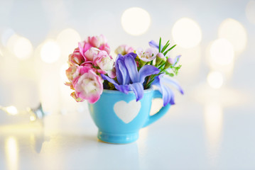 cup with flowers