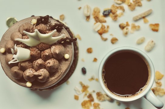 chocolate cake on the white plate with a cup of coffee, food macro photography decoration concept for new year party.