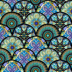Colorful floral seamless pattern from circles with mandala in patchwork boho chic style