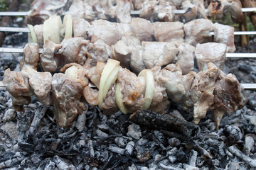  A close-up of meat cooking outdoors