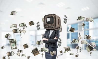 Fototapeta premium Business woman with old TV instead of head.