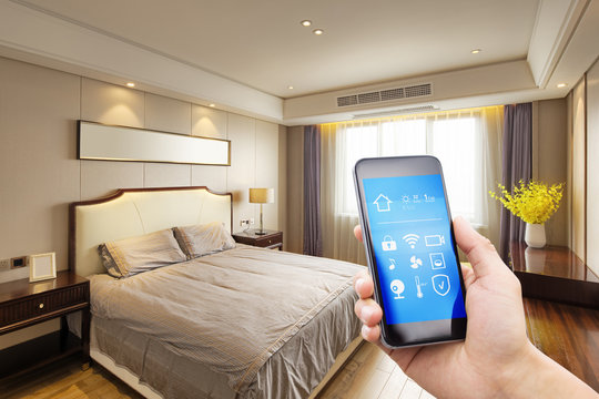 smart phone with smart home with modern bedroom