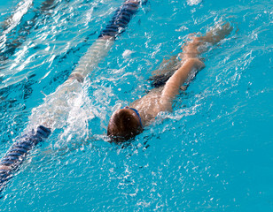 boy on a swim in a sports pool