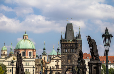 Fototapeta na wymiar Saint Francis of Assisi church and Charles Bridge in Prague