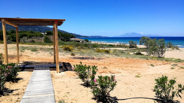 Sunny beach with sea blue view