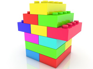 Stacked toy bricks in various colors