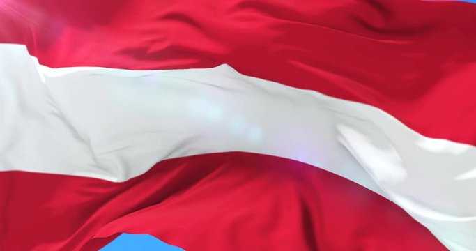 Austrian flag waving at wind with blue sky, loop