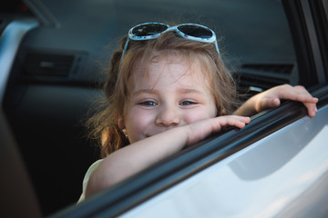 Girl in Car's Window