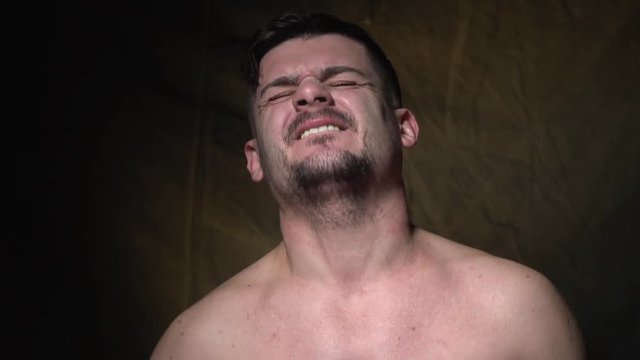 Bearded man has an orgasm