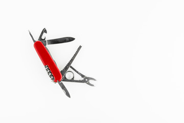Multi-functional Red Knife On White Background With Empty Space
