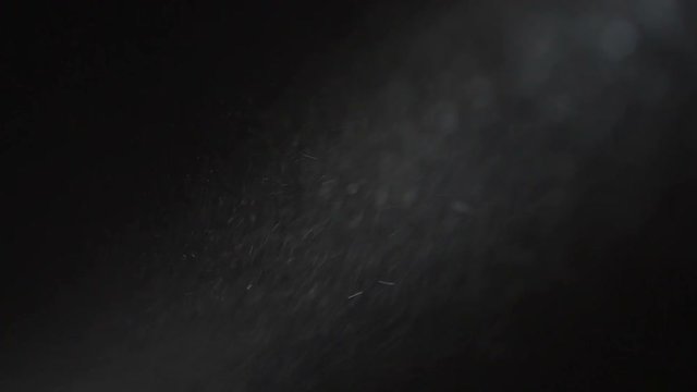 Particles And Smoke With Wind And Turbulence On Black Background