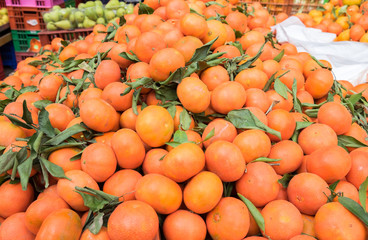 New harvest tangerines for sale at city market