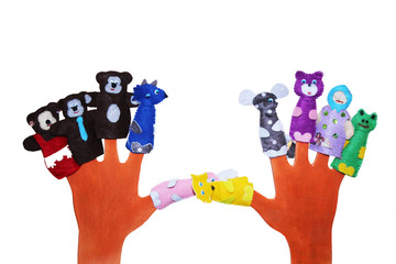 Hand wearing 5 finger puppets: dog, cock, cat, mouse, pig isolated on white
