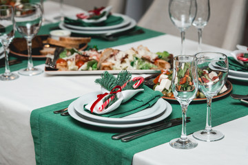 Served New Year or Christmas table closeup. Luxury restaurant