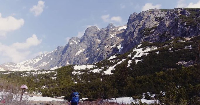 A tourist rises in the mountains in High Tatras, Slovakia