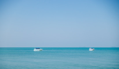 two boats in the tropical ocean