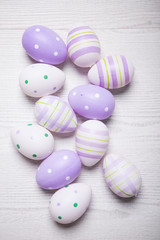 Fototapeta na wymiar Top view of Easter eggs on wooden background. Background with easter eggs. With retro filter effect