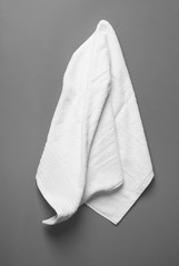 Soft terry towel on grey background