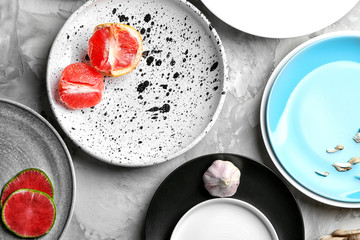Set of dishware with ingredients on table