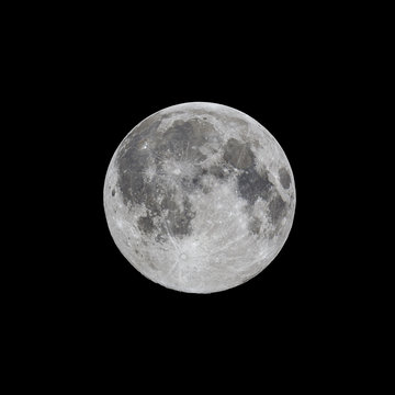 High contrast full moon on black night sky background
