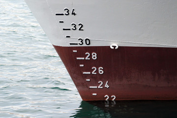 Ship hull with waterline and draft scale measure