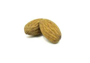 closeup almond nuts isolated on white background of file with Clipping Path .