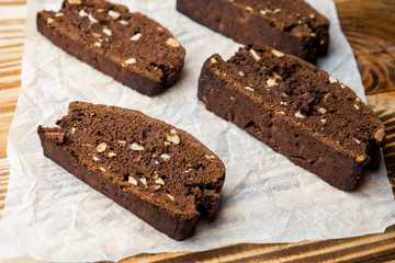 emade chocolate biscotti cookies with almonds on parchment paper