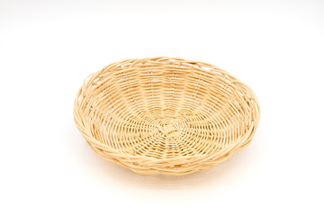 Fototapeta premium Small tray .Isolated on white background.Handicrafts of Thai people in rural areas.Can be used in many ways,put fruits or vegetables and other things.