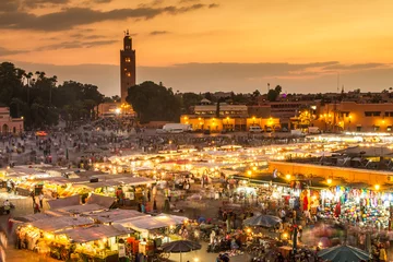 Fotobehang Jamaa el Fna marktplein, Marrakech, Marokko, Noord-Afrika. Jemaa el-Fnaa, Djema el-Fna of Djemaa el-Fnaa is een beroemd plein en marktplaats in de medinawijk van Marrakech. © kasto