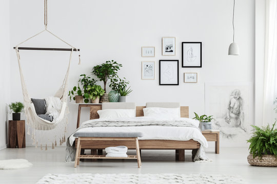 Natural bedroom with posters
