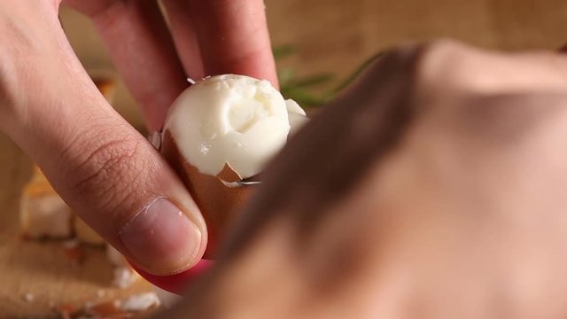 Eating one boiled egg with teaspoon