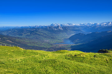Fototapeta na wymiar Panorama view from Rigi Mountains at lake Lucern and Village Brunnen. View from Rigi Switzerland