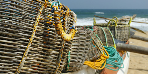 detail of fisherman boat , with net and basket