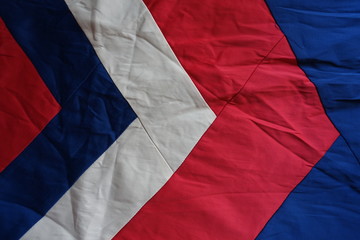 Stripes of blue, white and red cotton sewn together
