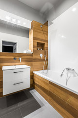 Bathroom with wood tiles
