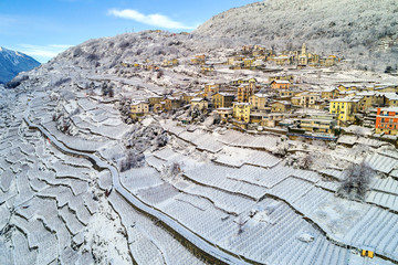 Valtellina (IT) - Vista aerea panoramica invernale di Sant'Anna a Sondrio