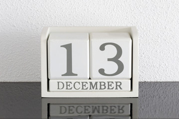 White block calendar present date 13 and month December